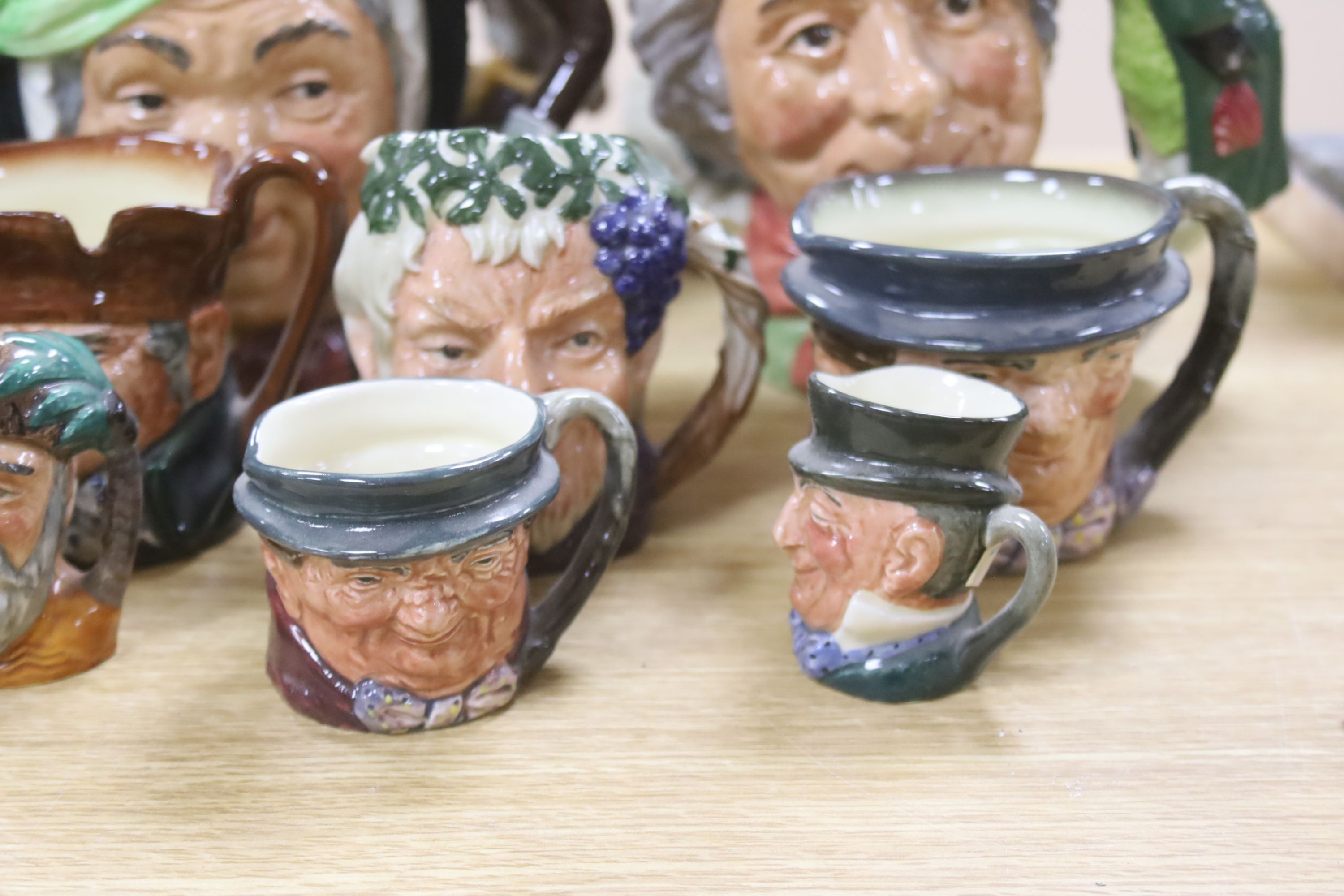 A collection of seventeen Royal Doulton character mugs